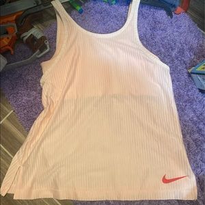 Womens light pink Nike tank with built in bra